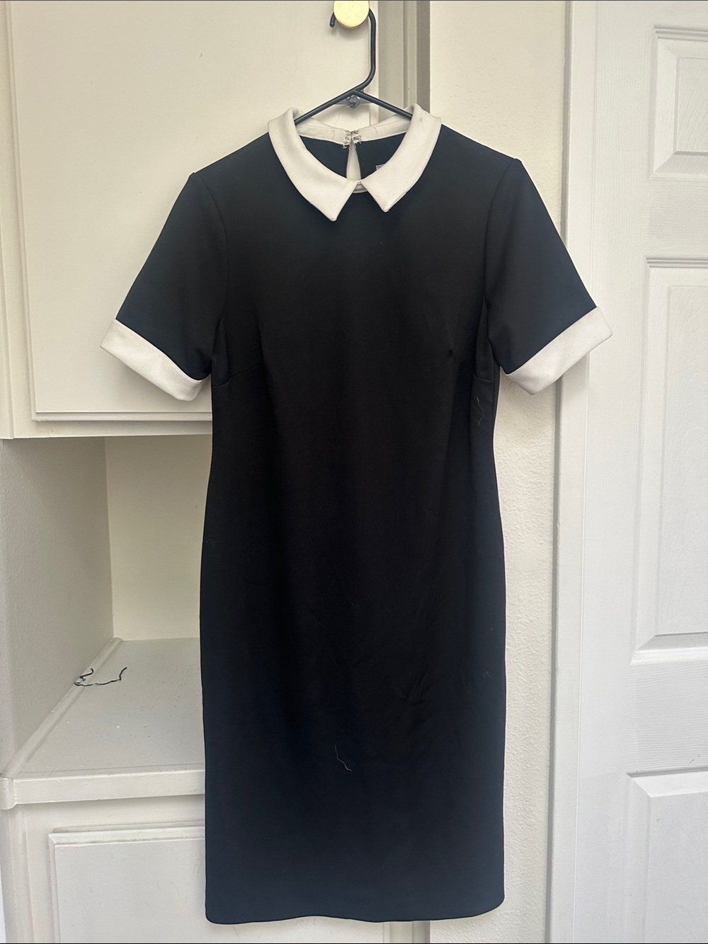 Classic Black Shift Dress with White Collar and Cuff